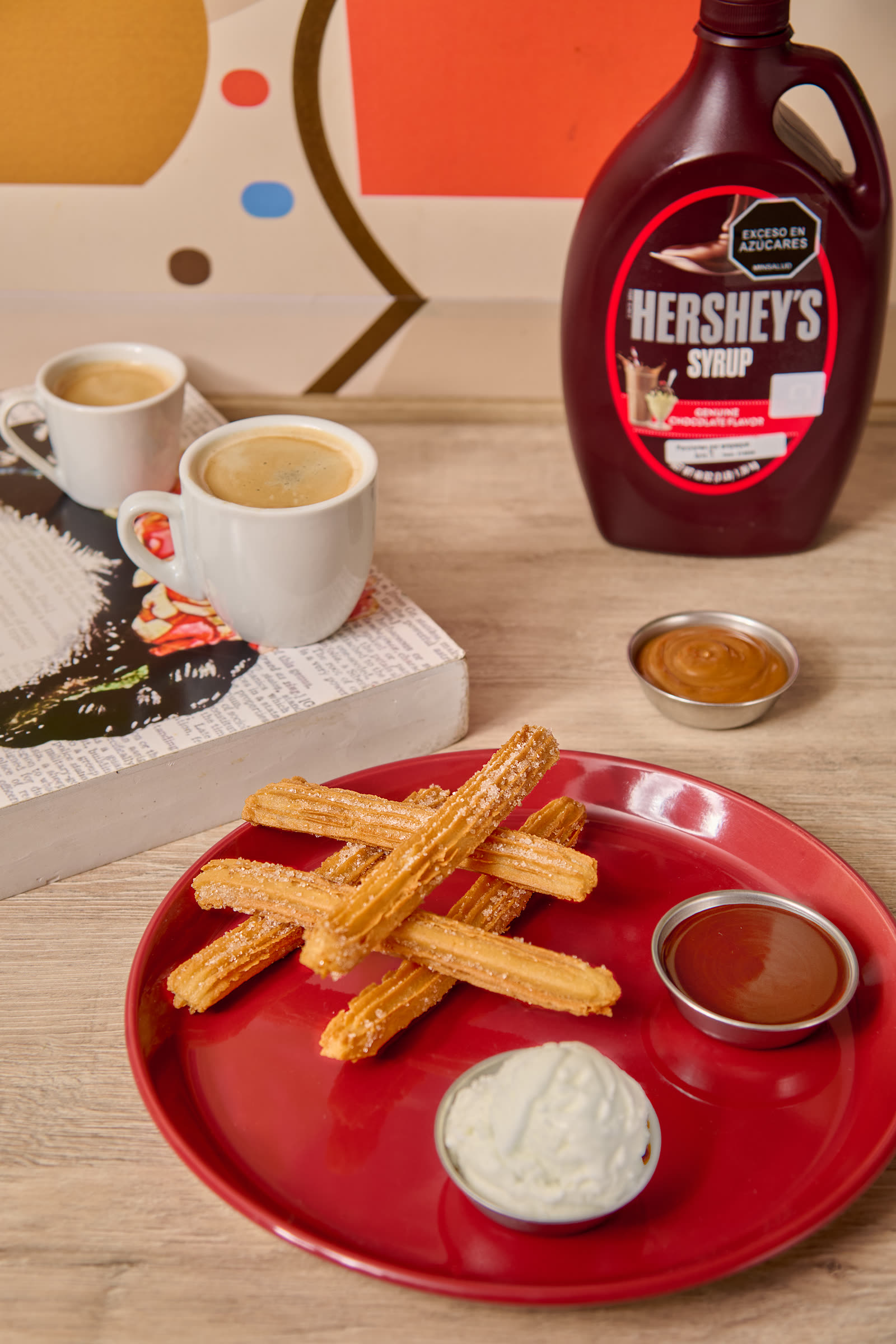 Churros mexicanos con arequipe y chocolate en Amor al Taco